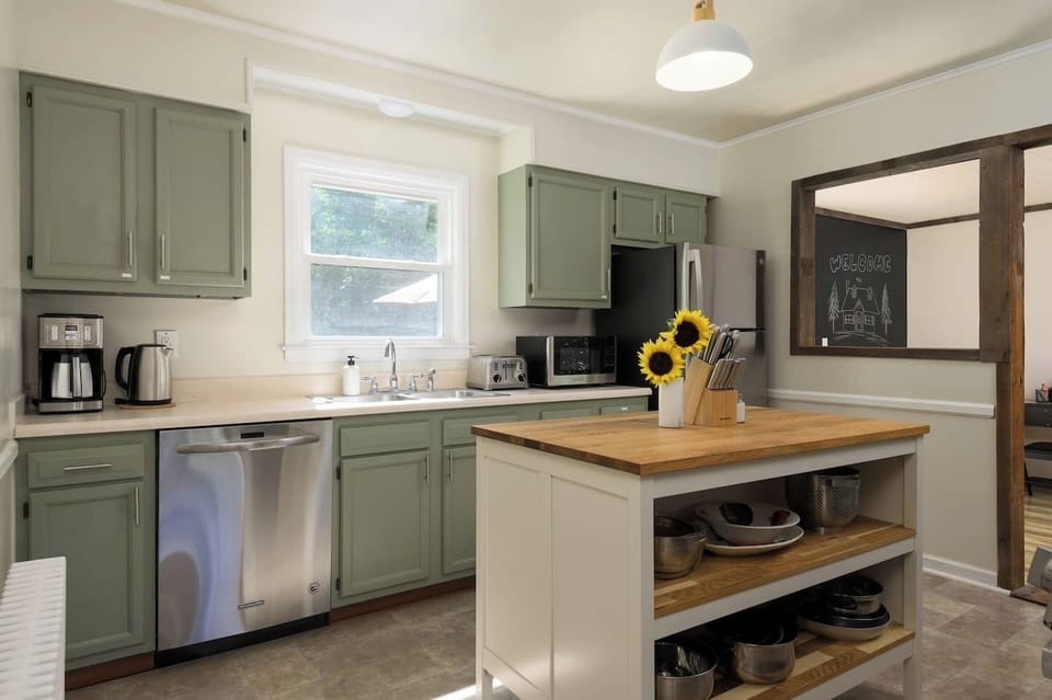 Whether you're whipping up breakfast or grilling out back, the kitchen is equipped with everything you need - including a drip coffee maker, Brita filter, and all the essentials.