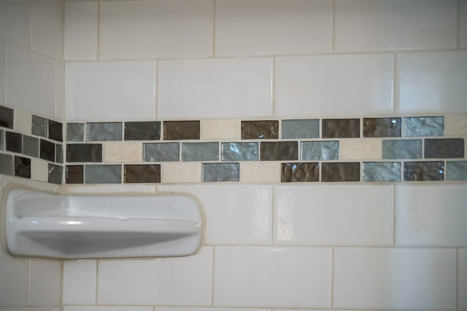 Updated shower tile detail for a clean, fresh bathroom feel