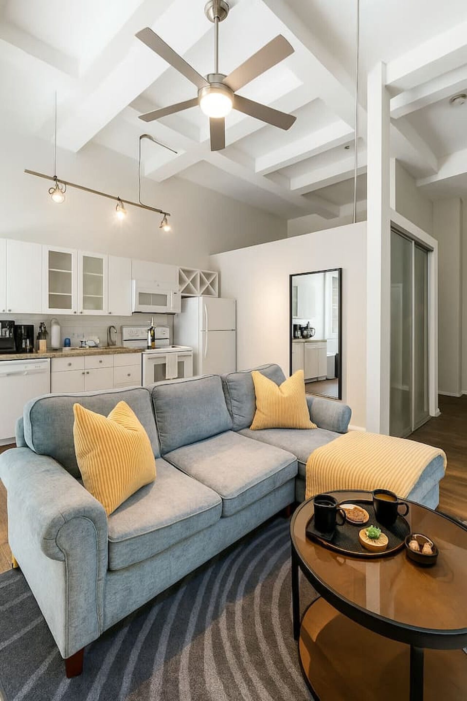 As you take a seat in the living room, the comfortable furniture and tasteful design make it easy to unwind.