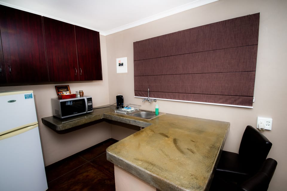 Coffee/tea maker, fridge, microwave, electric kettle