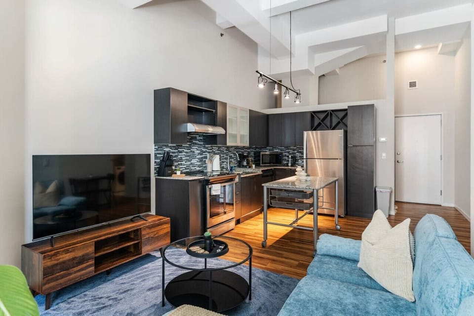 Relax in the living room and watch your favorite shows, lounging is a great way to unwind after a long day.