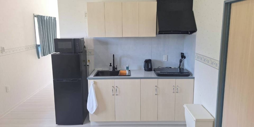 Villa, Ocean View | Private kitchen | Fridge, stovetop, cookware/dishes/utensils, freezer