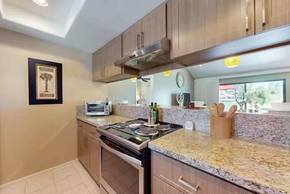 Fully equipped kitchen with granite countertops
