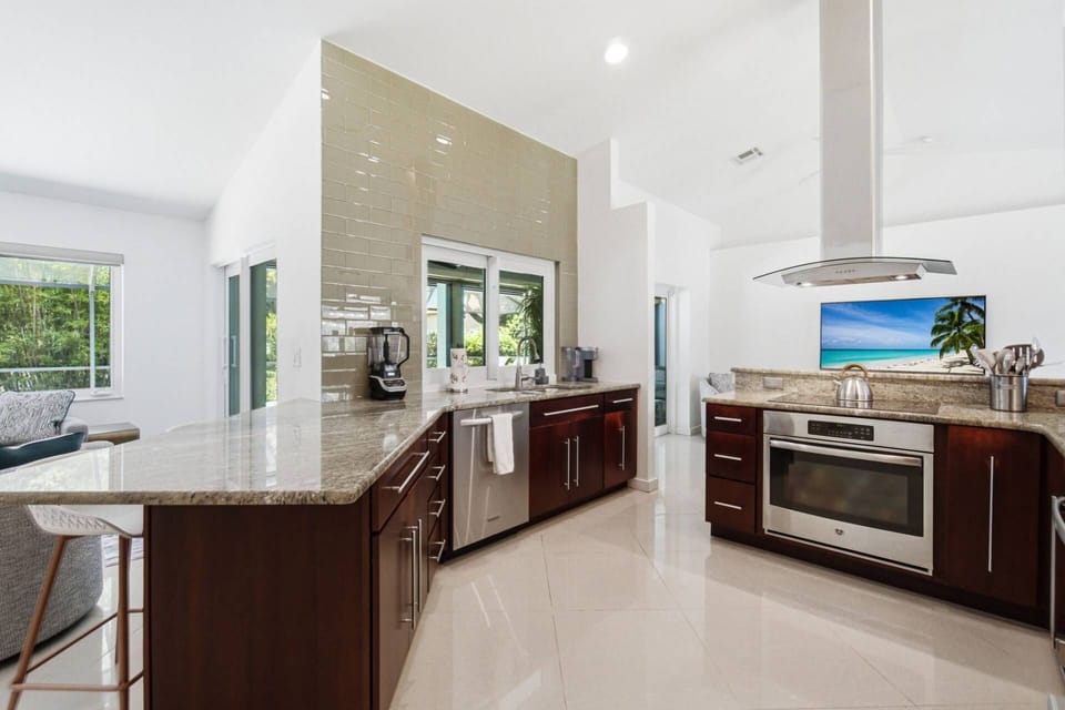 The kitchen offers plenty of space for those who prefer to eat in vs dine out.