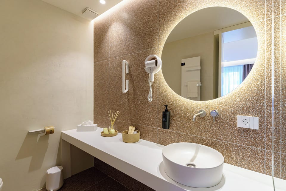 Hair dryer, slippers, bidet, towels