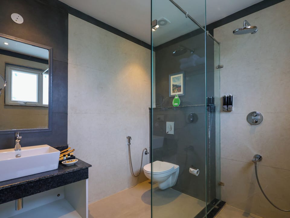 Executive Room, Mountain View | Bathroom | Shower, rainfall showerhead, hair dryer, slippers