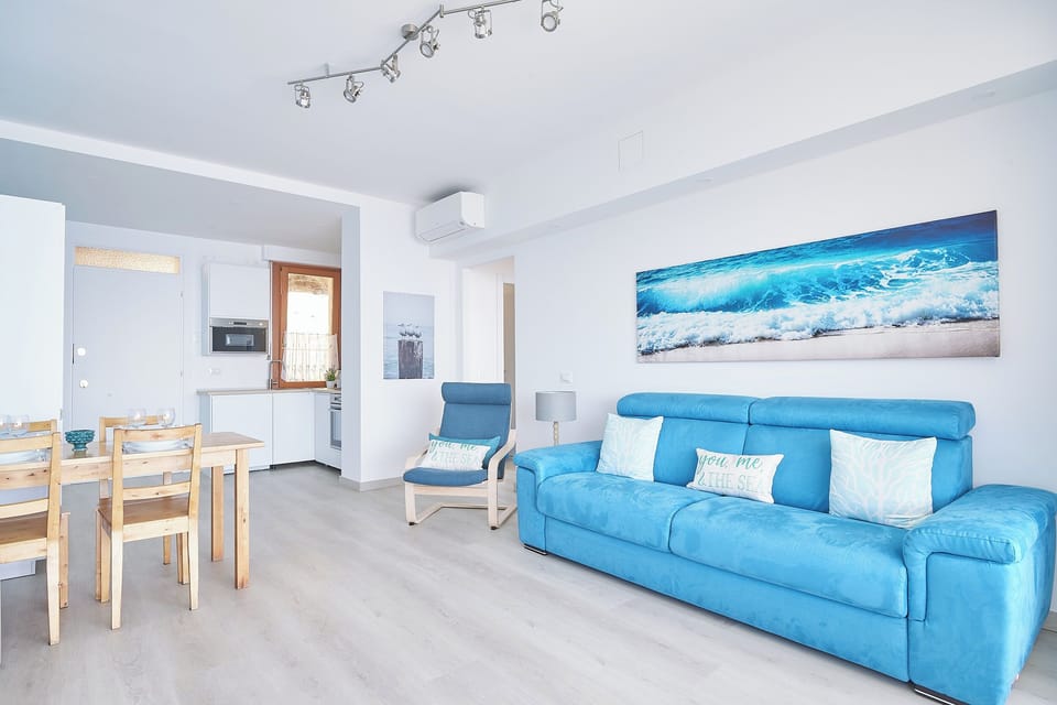 Apartment (2 Bedrooms) | Living area | 32-inch TV with cable channels