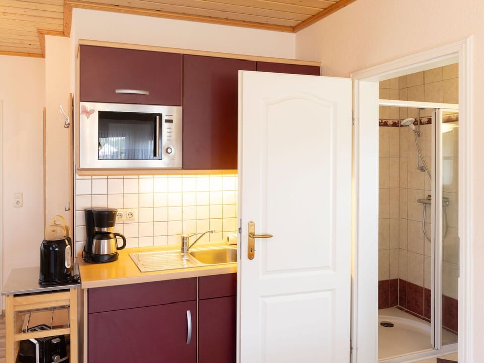 Wood, Interior Design, Flooring, Floor, Sink, Plumbing Fixture, Furniture, Room, Tap, Plumbing