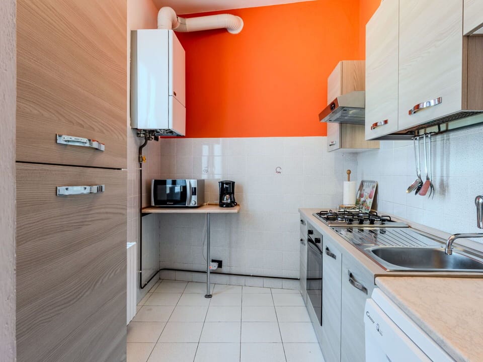 Kitchen, Interior Design, Major Appliance, Wood, Kitchen Appliance, Flooring, Furniture, Countertop, Floor, Cabinetry