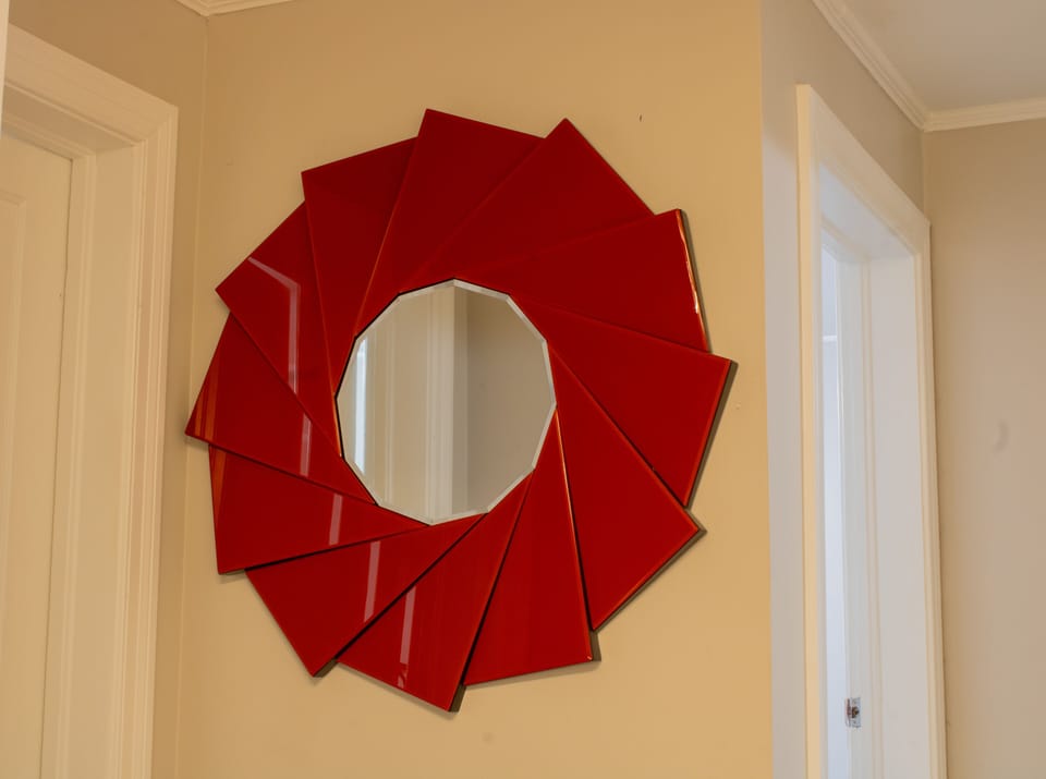 “Artistic glass mirror.”