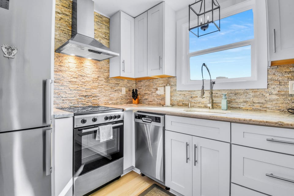 Kitchen - European Appliances including a dishwasher and oven! 
