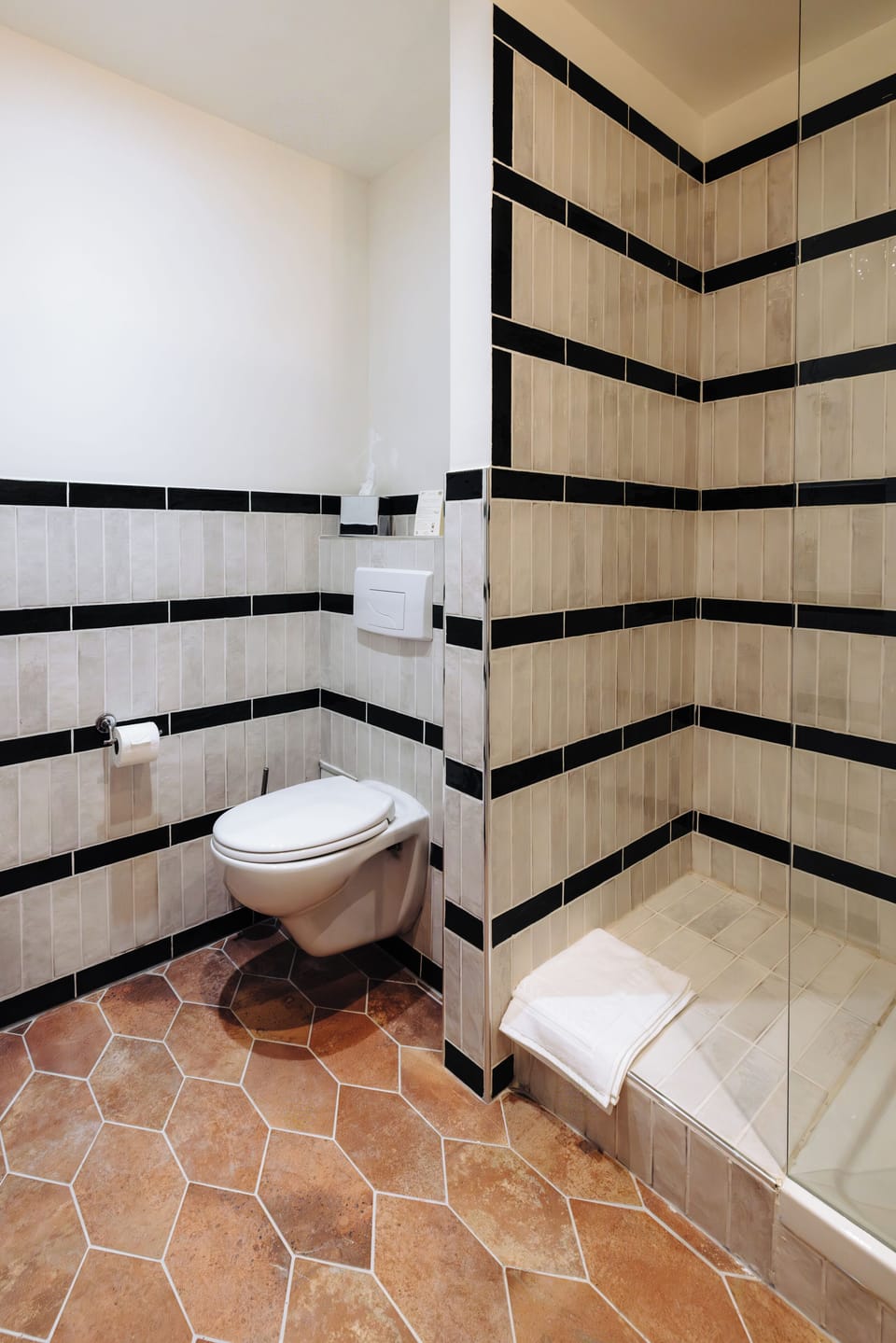 Shower, free toiletries, hair dryer, towels