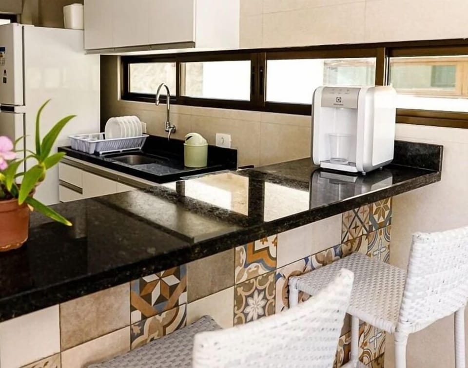 Villa | Private kitchen | Dining tables