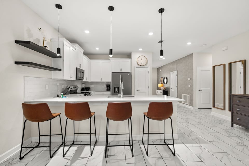 Kitchen Island That Seats 4 People & Kitchen In Background