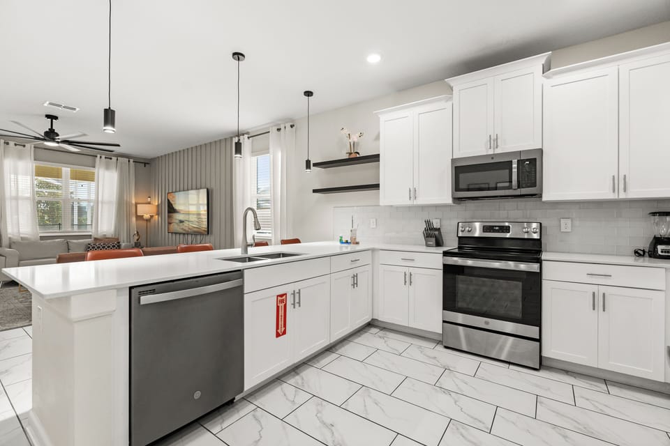 Kitchen with Dishwasher, Dual Sinks, Stove & Microwave