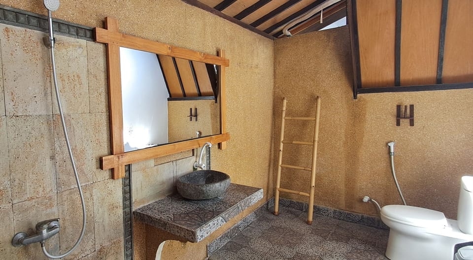 Superior Bungalow, Garden View | Bathroom | Shower, towels, soap, shampoo