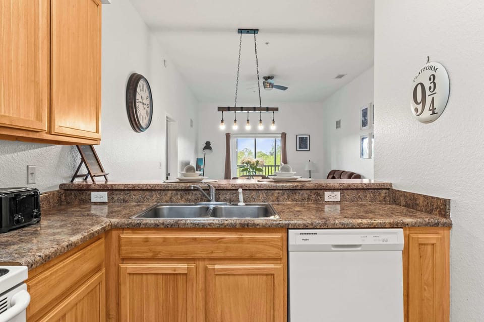 Condo, Multiple Beds, Balcony, Garden View (Bella Notte At Caribe Cove) | Private kitchen | Fridge, microwave, oven, stovetop