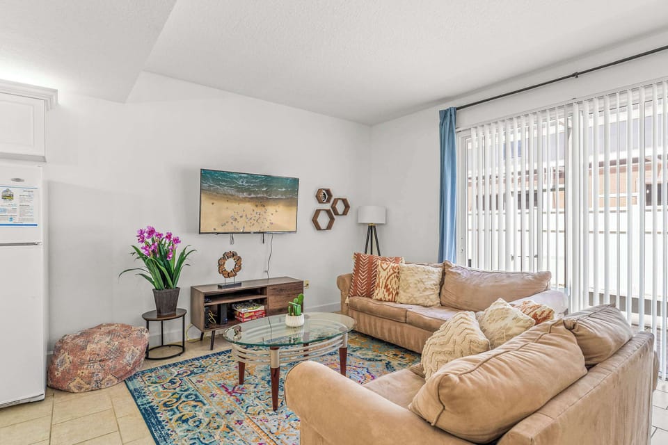 Townhome, Multiple Beds, Patio, Garden View (Family Friendly Relax Villa) | Living area | 42-inch flat-screen TV with digital channels