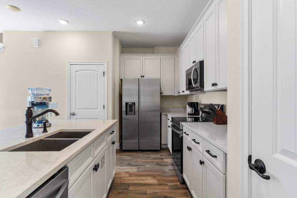 Townhome, Multiple Beds, Patio, Garden View (Flamingo Paradise) | Private kitchen | Fridge, microwave, oven, stovetop