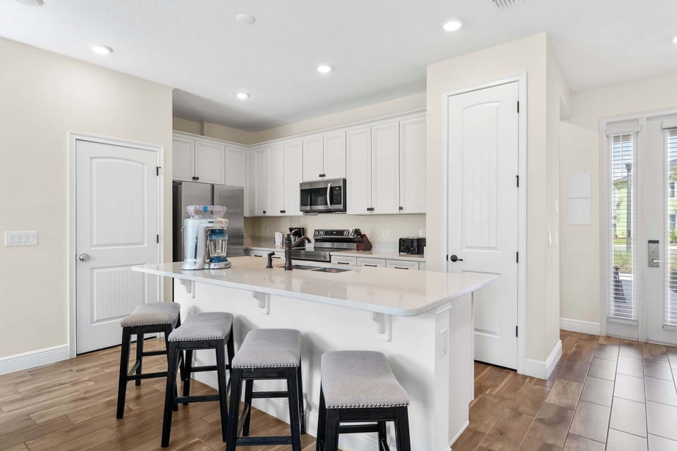 Townhome, Multiple Beds, Patio, Garden View (Flamingo Paradise) | Private kitchen | Fridge, microwave, oven, stovetop