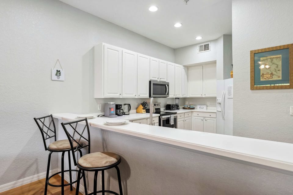 Condo, Multiple Beds, Patio, Garden View (Get Away Bay at Bahama Bay) | Private kitchen | Fridge, microwave, oven, stovetop