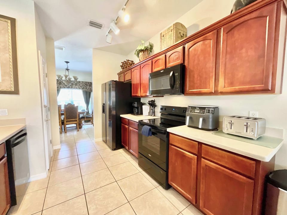 House, Multiple Beds, Pool Access, Garden View (Marcella’s Villa At Acadia Estates) | Private kitchen | Fridge, microwave, oven, stovetop