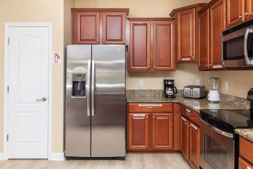 House, Multiple Beds, Pool Access, Pool View (Mickey’s Mansion At Championsgate) | Private kitchen | Fridge, microwave, oven, stovetop