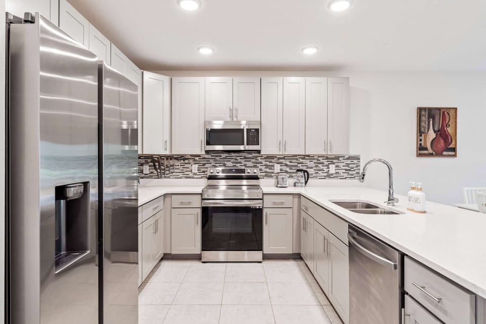 Townhome, Multiple Beds, Patio (Once Upon a Stay) | Private kitchen | Fridge, microwave, oven, stovetop