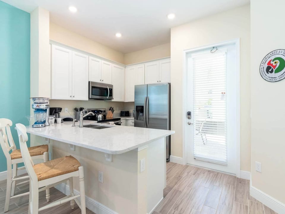 House, Multiple Beds, Patio, Garden View (Parrotfish Place) | Private kitchen | Fridge, microwave, oven, stovetop