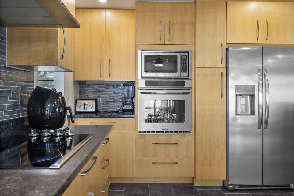 Fully Equipped Kitchen | Built-In Oven & Microwave | Sleek Cabinetry