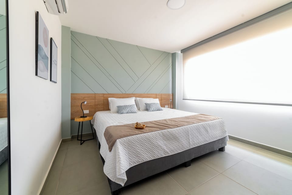 Deluxe Double Room, 1 King Bed, Pool View | In-room safe, desk, laptop workspace, blackout drapes