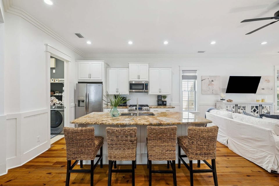 Large kitchen island in the fully equipped kitchen provides plenty of counter space with seating for 4 people!