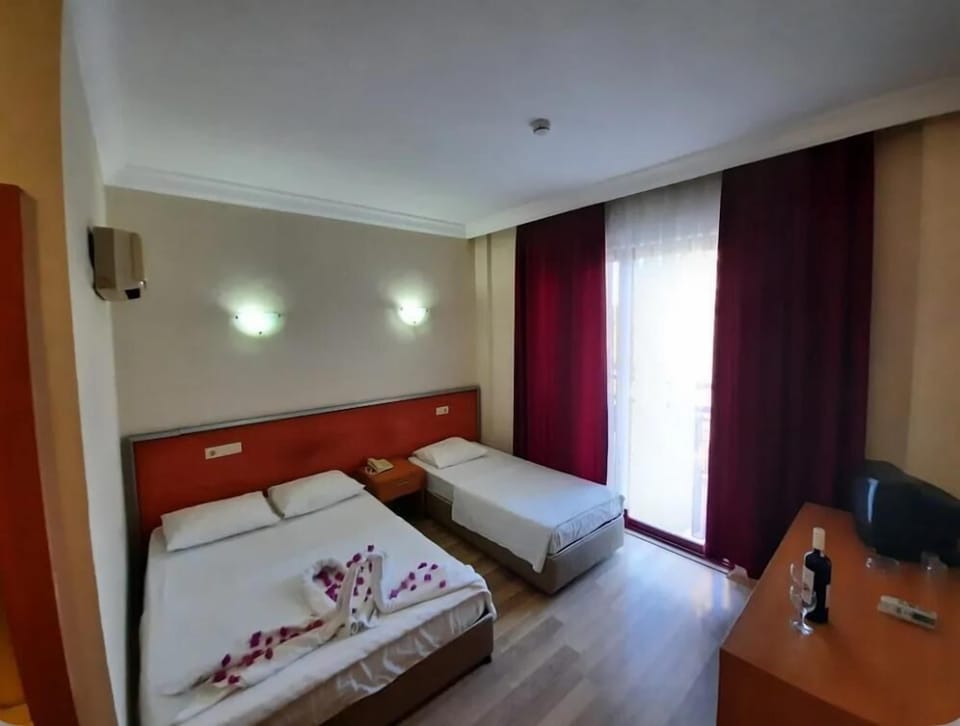 Standard Double or Twin Room, Pool View | In-room safe, desk, laptop workspace, free WiFi