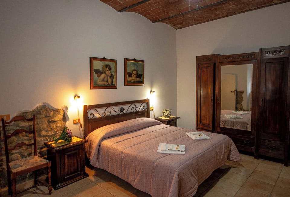 Triple Room, Patio, Garden View | Desk, free WiFi