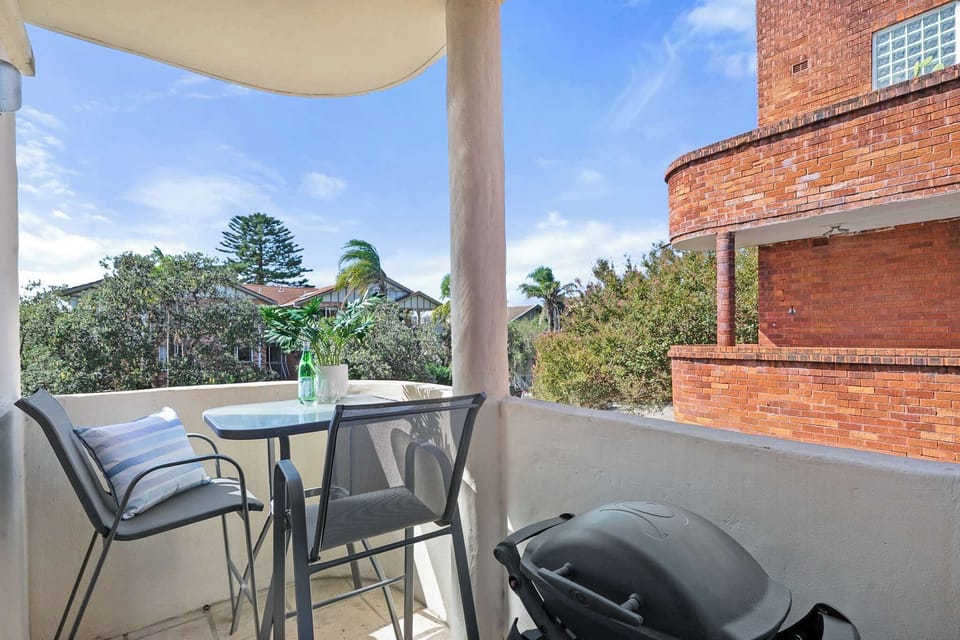 Small balcony perfect to enjoy alfresco dining, also has a Weber BBQ perfect to use all year round. 