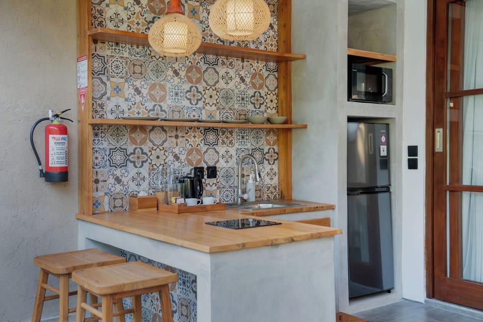 Villa, 1 Bedroom, Pool View | Private kitchen | Fridge, microwave, stovetop, electric kettle