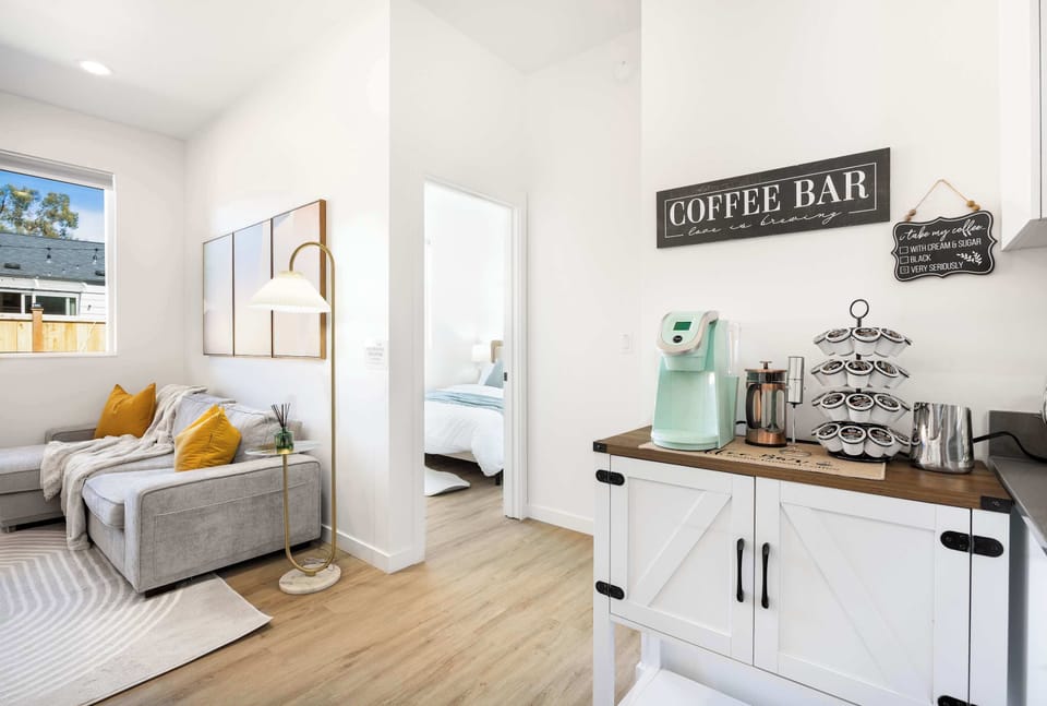 Start your day with a fresh cup of coffee or tea at this dedicated coffee station! Stocked with essentials like coffee, sugar, and tea, this cozy nook is a thoughtful touch for guests.