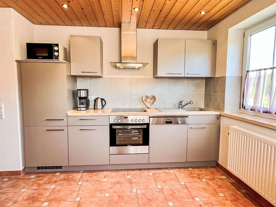 Kitchen Appliance, Kitchen, Cabinetry, Countertop, Furniture, Flooring, Major Appliance, Interior Design, Wood, Home Appliance