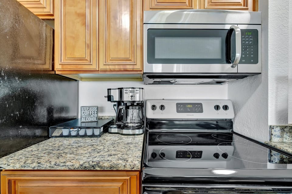 Coffee lovers, rejoice! Your morning brew is just a button away. Plus, a fully equipped kitchen for all your culinary adventures! 