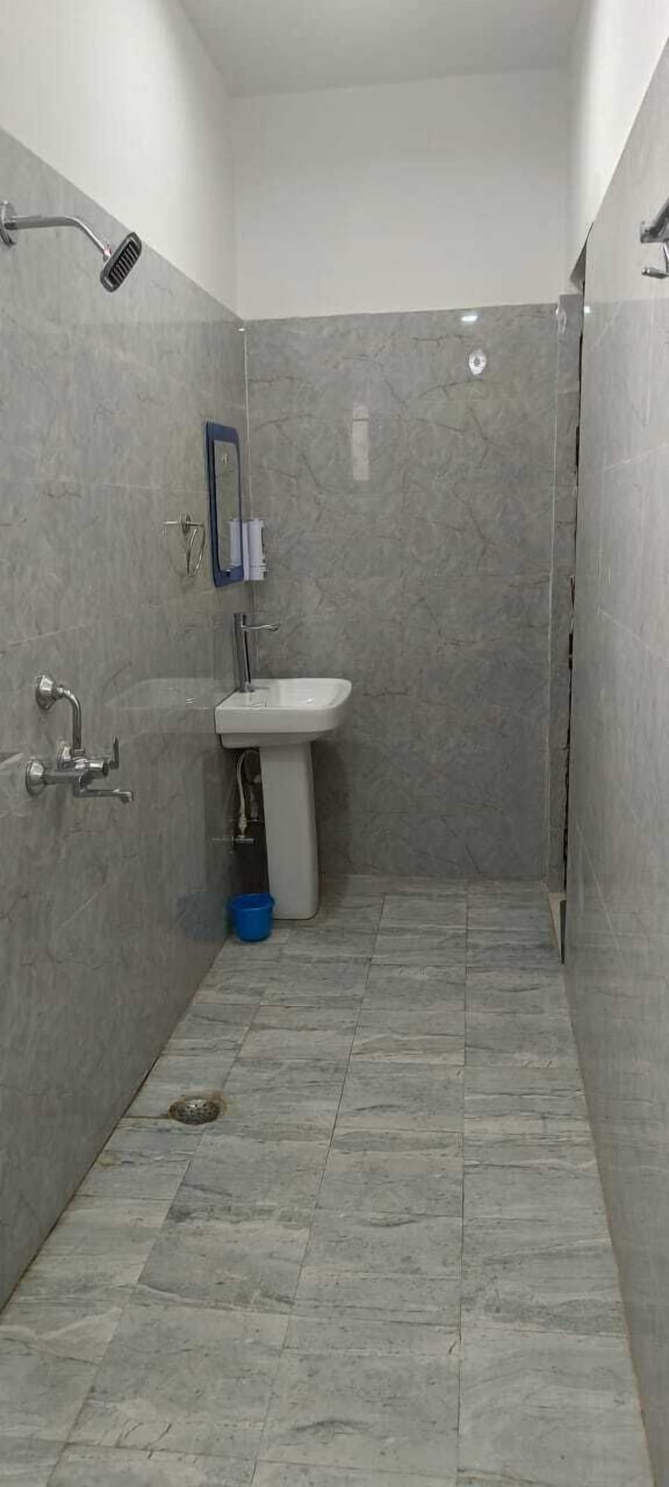 Shower, slippers, towels, soap