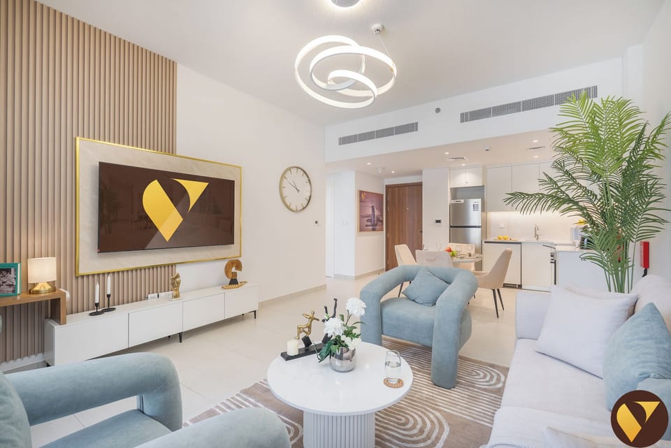 Luxury Apartment, Balcony, Pool View | Living area | 65-inch Smart TV with cable channels