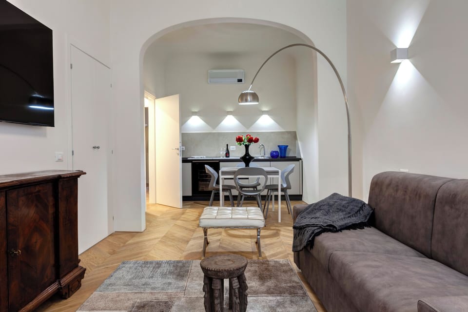 Apartment | Living area | 30-inch flat-screen TV with digital channels