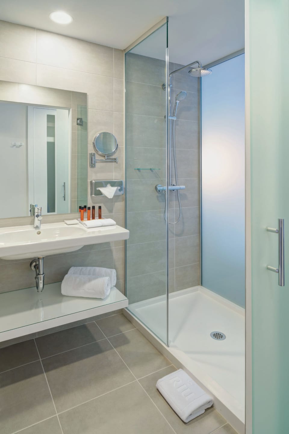 Eco-friendly toiletries, hair dryer, towels