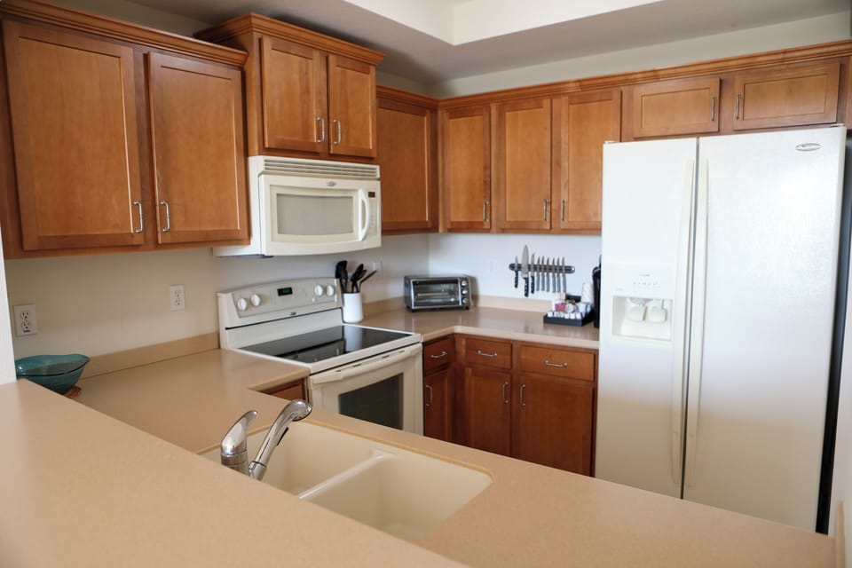 Fully equipped kitchen with all the essentials for preparing meals with ease.
