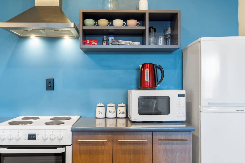 All your basics covered with this efficient setup—ideal for short stays or light cooking needs.