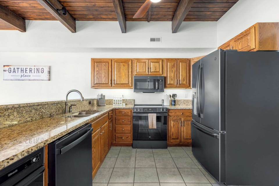 Fully equipped kitchen with everything you need for meals and counter seating for 4
