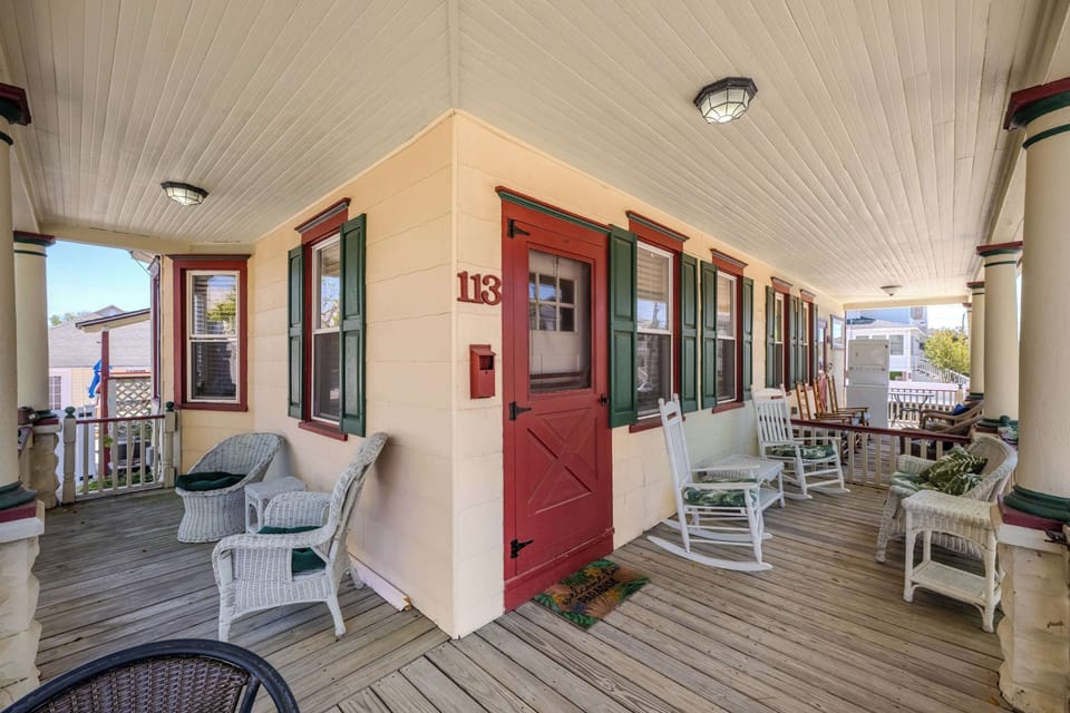 Enjoy your private half-duplex retreat with wraparound porch and inviting curb appeal.
