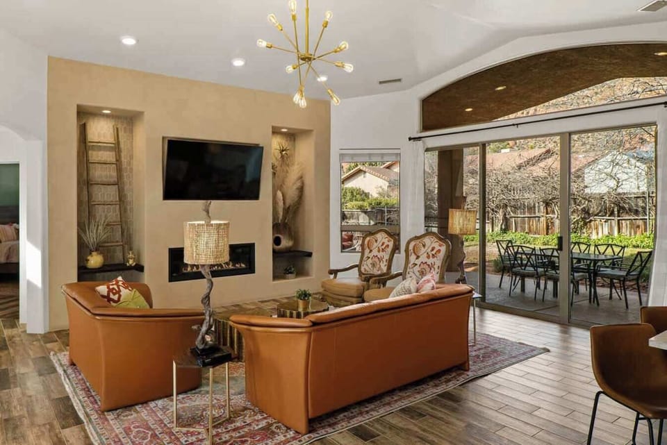 Unwind in the comfortable living room with a fireplace.