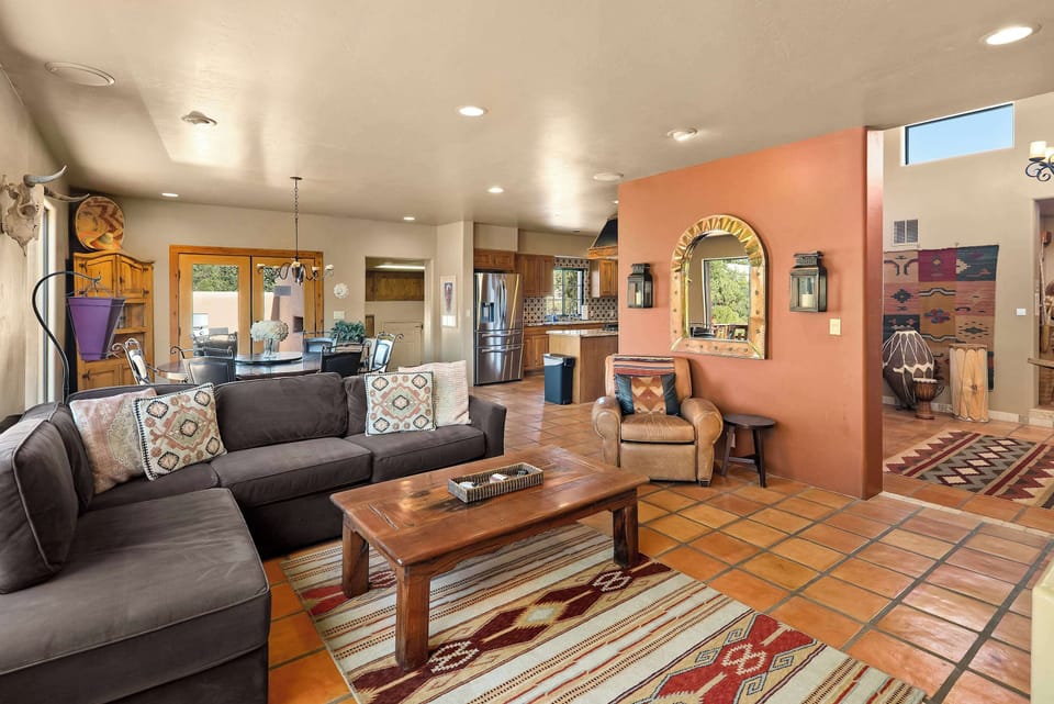 Enjoy seamless indoor-outdoor living from the main area.