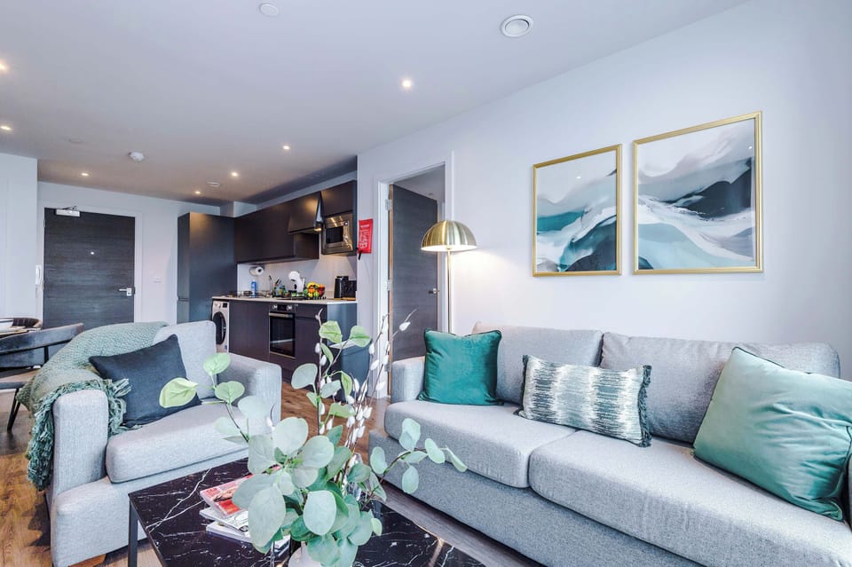 The open-plan living room, dining area and kitchen benefit from a comfortable sofa, SMART TV, complimentary coffee pods, and everything you could possibly need to cook a meal away from home.